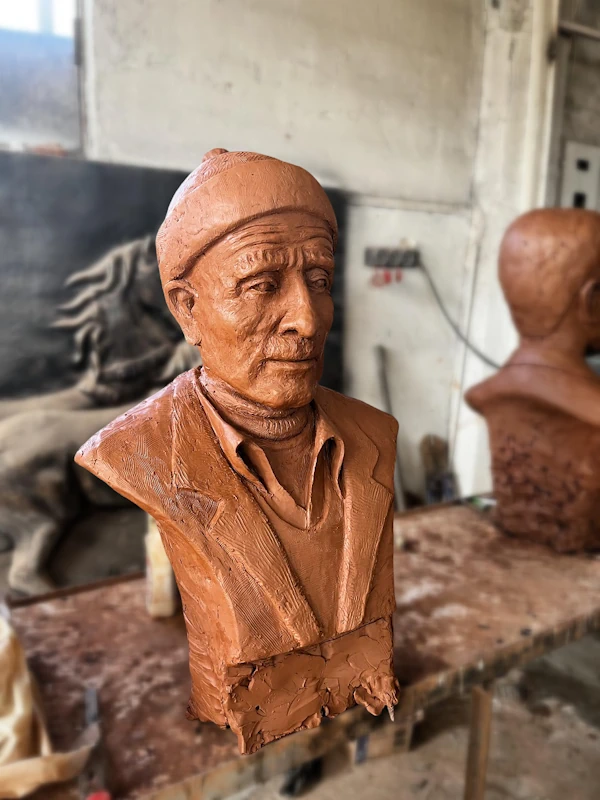 Father and Son Statue Frontal Detail View