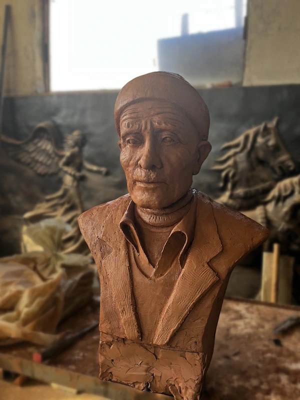 Father and Son Statue Installation by Bust Sculptures