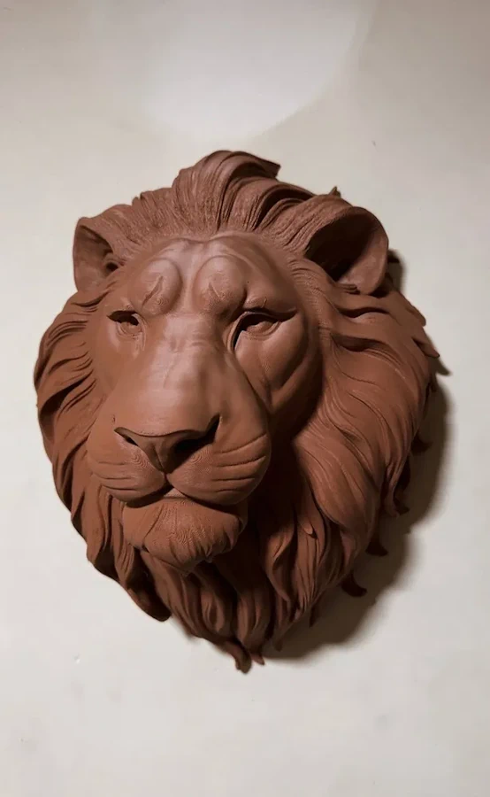 Lion Mask Installation by Relief Sculptures