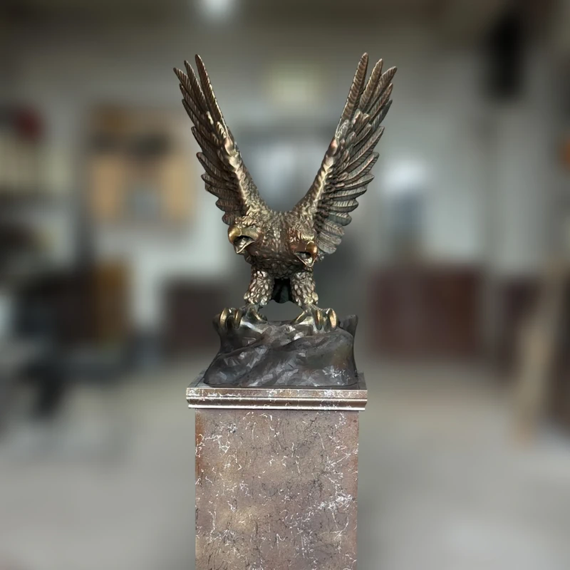 Small Gift Eagle Statue Installation by Animal Sculptures