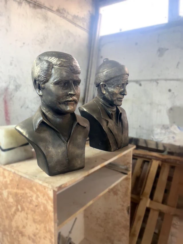 Father and Son Statue Side Profile View