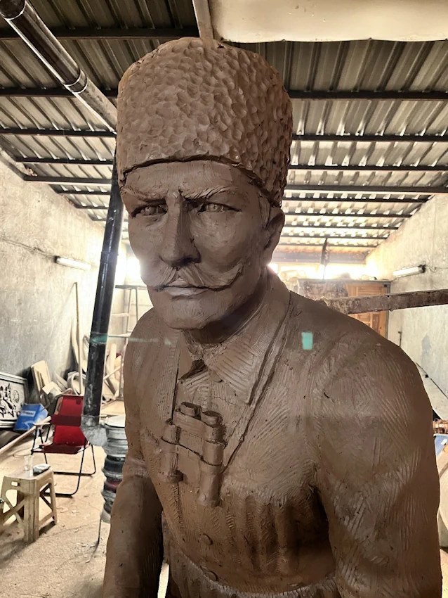 Avci Mahmut Statue Frontal Detail View