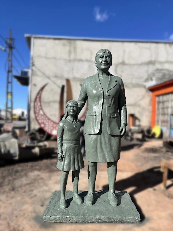 Turkan Saylan Statue Installation by Monument Sculptures