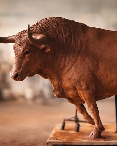 Powerful bull sculpture symbolizing strength and determination