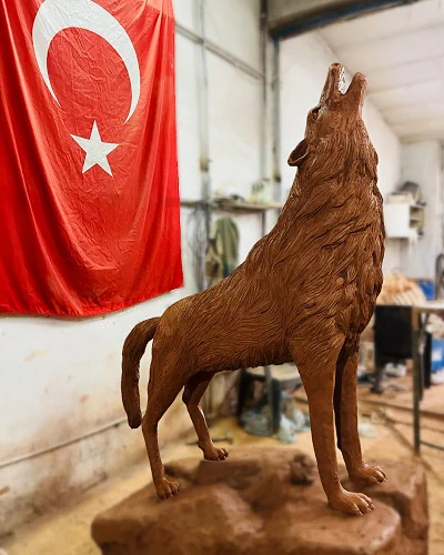 Howling grey wolf sculpture bronze coated stone base garden wolf sculpture