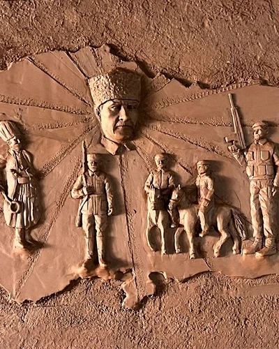 Clay relief in the shape of Turkey's map with soldier figures